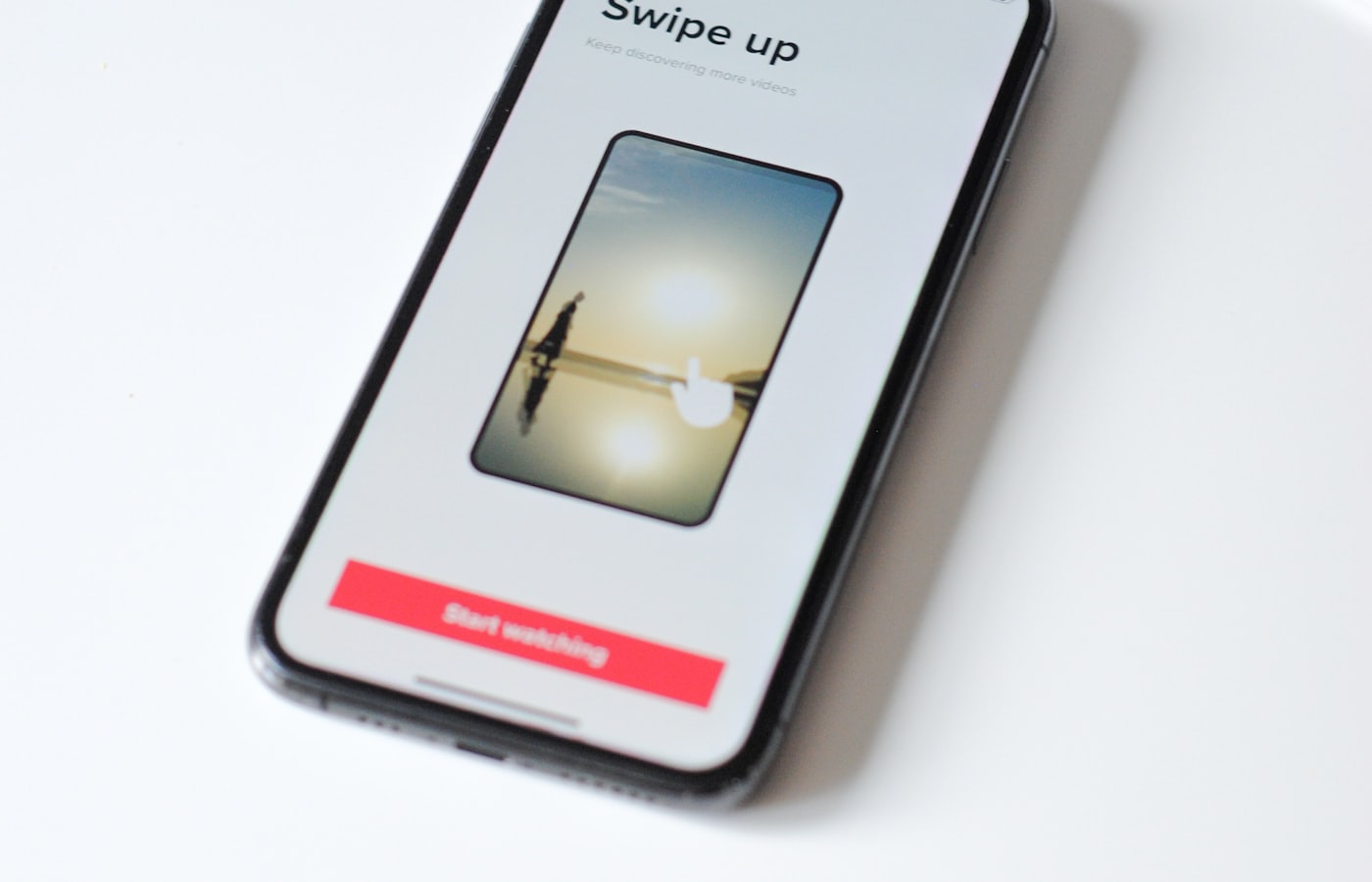 Smartphone home screen with app store icons where small business apps are published